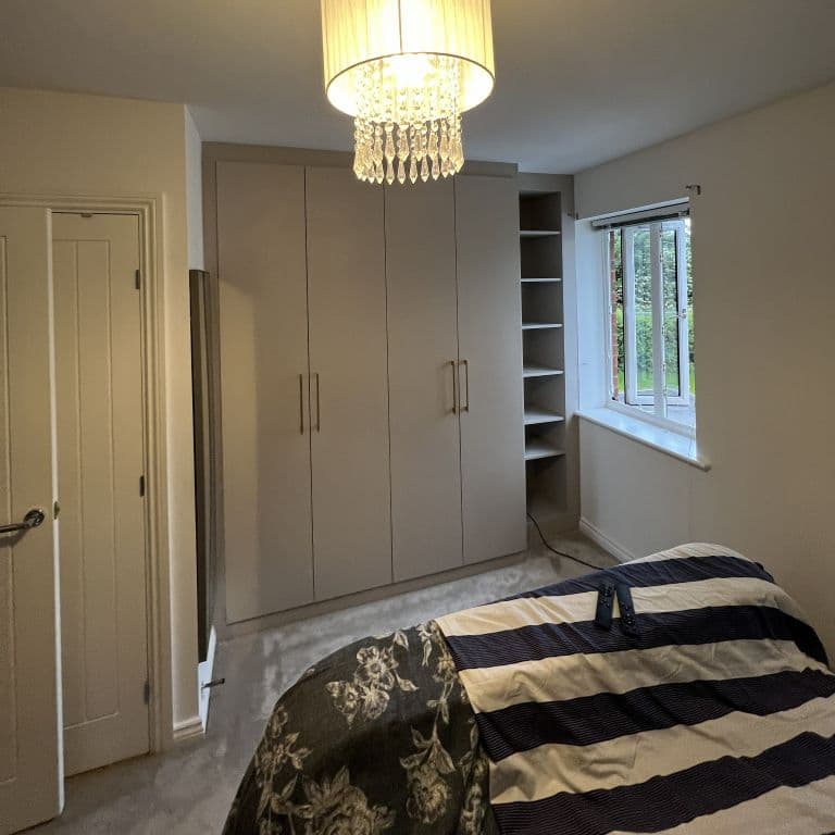 Classic hinged door fitted bedroom furniture in a Manchester home
